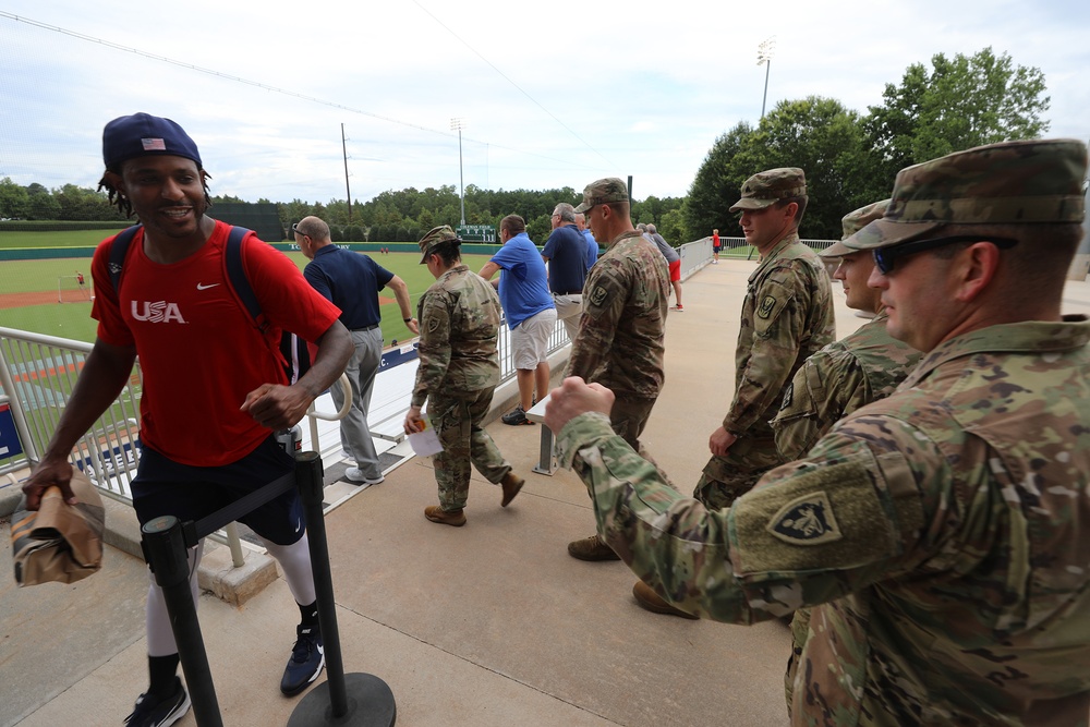 The USA Baseball Olympic Team hosts North Carolina National Guard Soldiers  at the USA Baseball National Training Complex in Cary, North Carolina, July  18, 2021. The Soldiers, during a ceremony before the