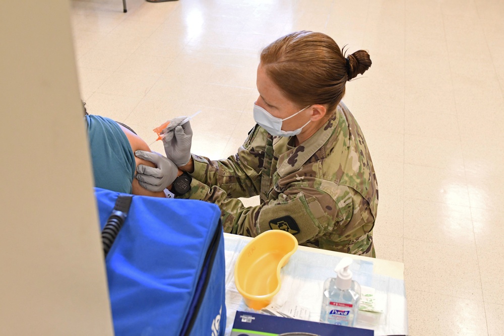 Tripler Army Medical Center Provider Administers COVID-19 Vaccine