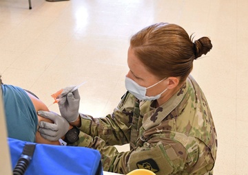 Tripler Army Medical Center Provider Administers COVID-19 Vaccine