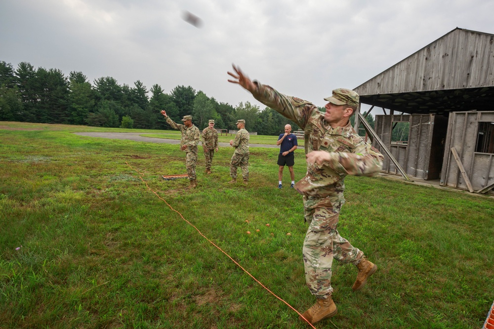 Maj. James Fink throws practice grenade