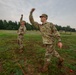 Staff Sgt. Trevor Thompson and  Sgt. Michael Yarrington throw practice grenade