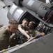 Marne Air Soldiers conduct maintenance on a UH-60 Black Hawk helicopter.