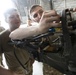 Marne Air Soldiers conduct maintenance on a UH-60 Black Hawk helicopter.