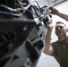 Marne Air Soldiers conduct maintenance on a UH-60 Black Hawk helicopter.