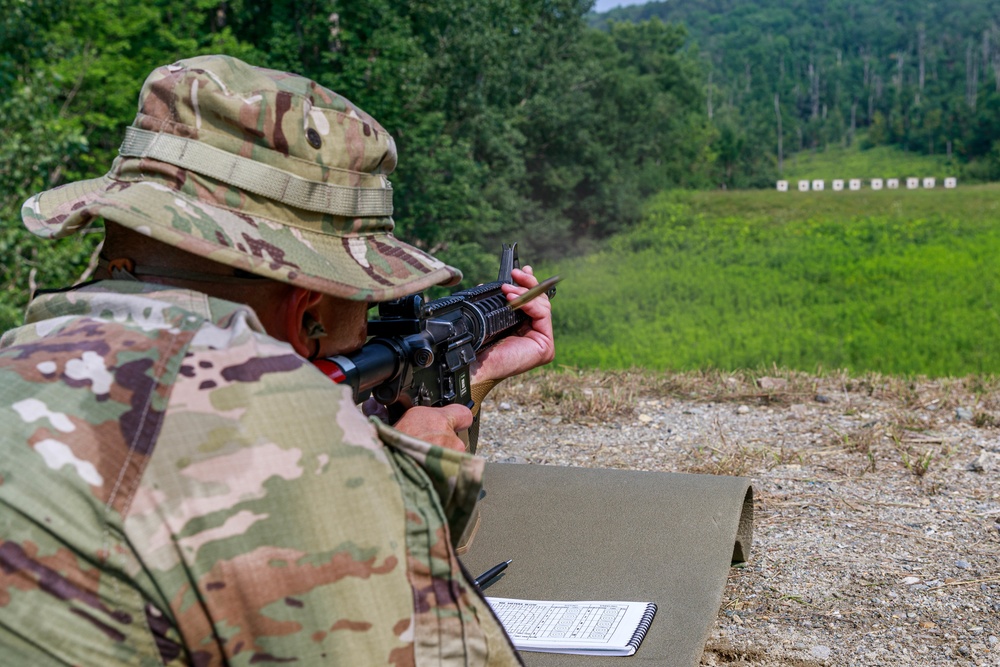 1st Lt. Joshua Moeller fires an M4 rifle