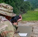 1st Lt. Joshua Moeller fires an M4 rifle