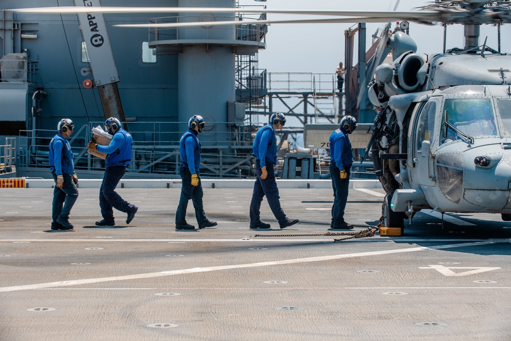 USS Lewis B. Puller Conducts Flight Operations With HSC-26