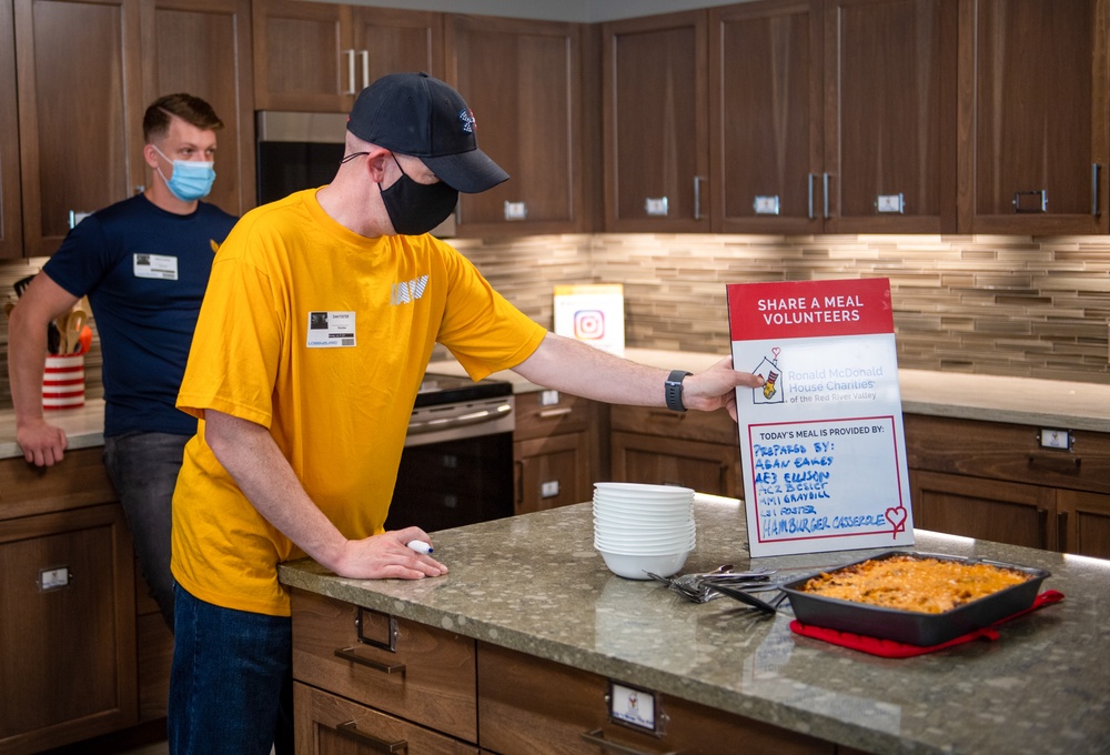 Nimitz Sailors Cook for Ronald McDonald House Families during Fargo Navy Week
