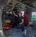 HSC 28 Sailor Cleans the Interior of an MH-60S Seahawk Helicopter