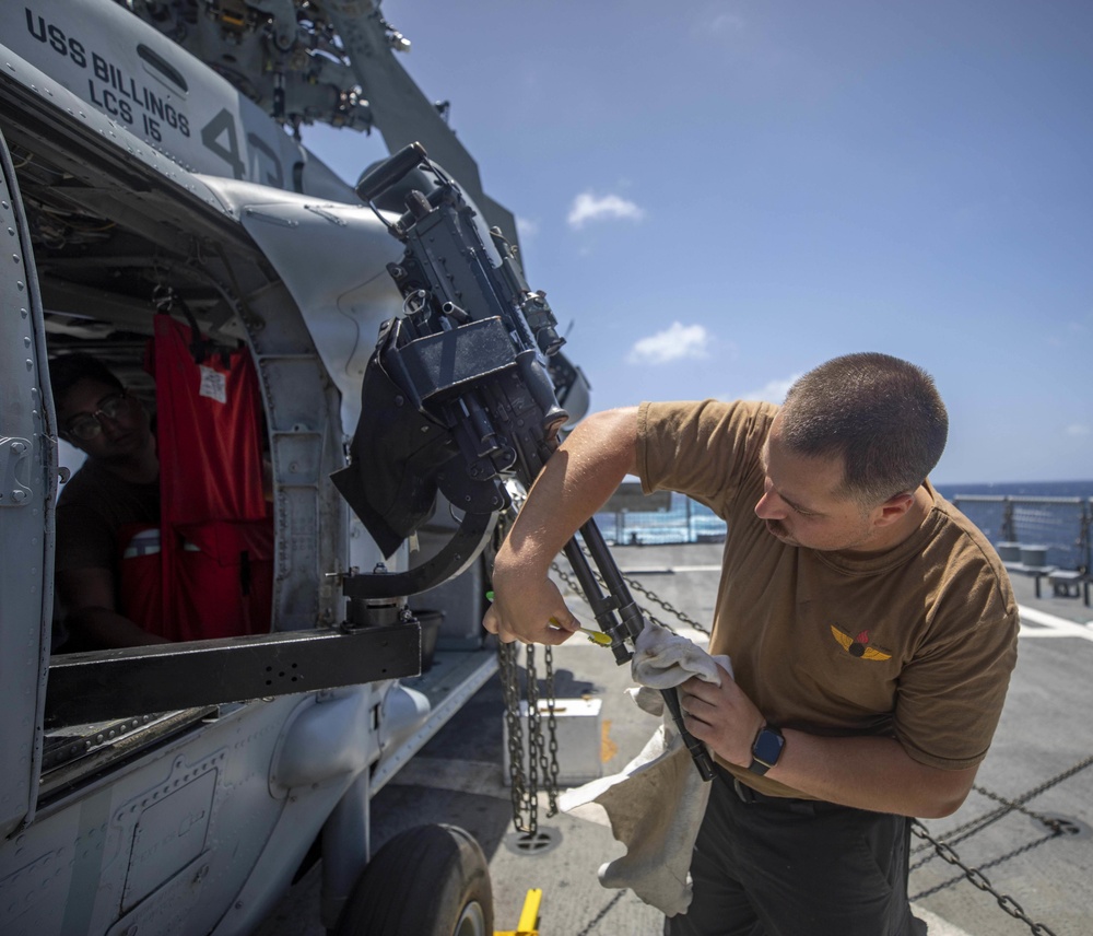 HSC 22 Sailors Cleans an M240D Machine Gun