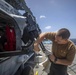 HSC 22 Sailors Cleans an M240D Machine Gun