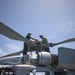 HSC 28 Sailors Perform Maintenance on an MH-60S Seahawk Helicopter