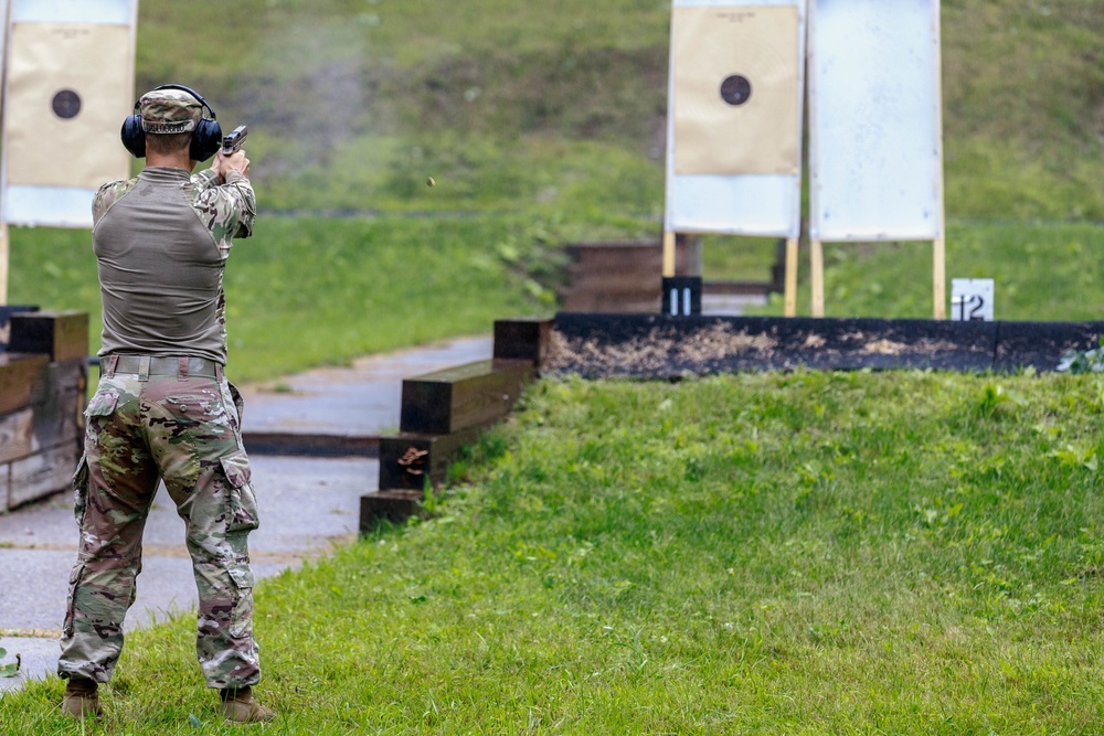 Maj. Nicole Dallocchio fires an M17 pistol