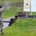 Maj. Nicole Dallocchio fires an M17 pistol