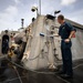 USS Sioux City Sailors Conduct a Freshwater Washdown