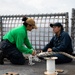 HSC 22 and USS Sioux City Sailors Repair Mooring Lines on the Flight Deck