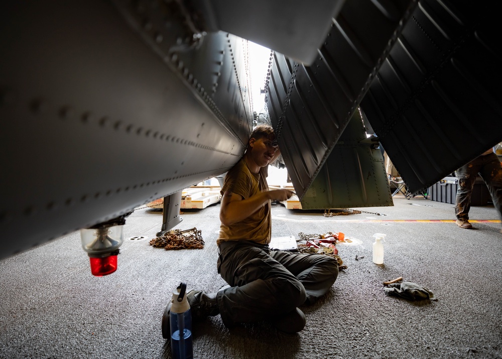 HSC 22 Sailor Conducts Maintenance on an MH-60S Seahawk