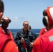 USS Sioux City Sailor Conducts a Debrief