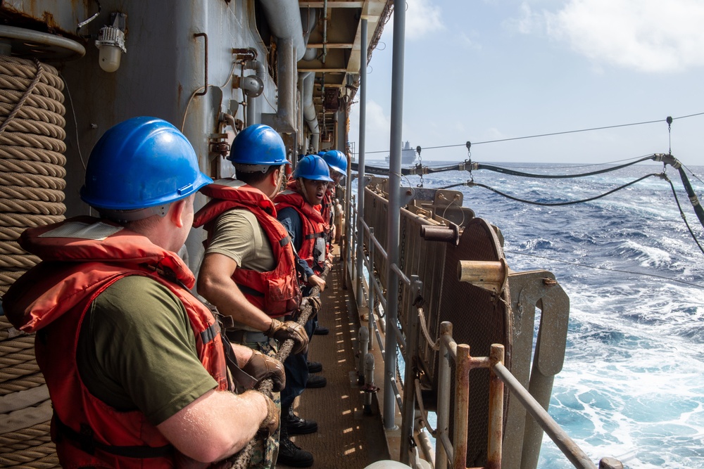 USS Germantown sailors heave messenger line.