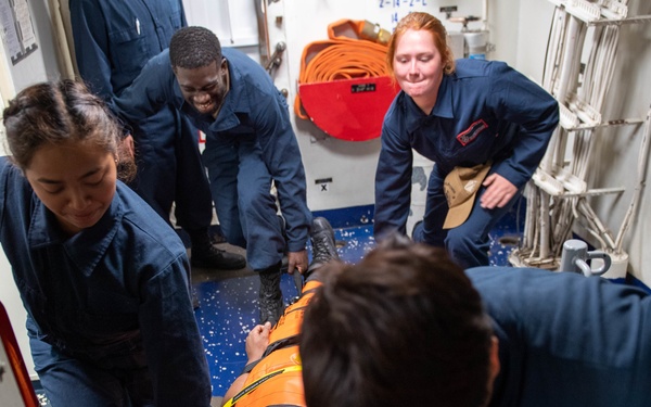 Sailors participate in casualty drill