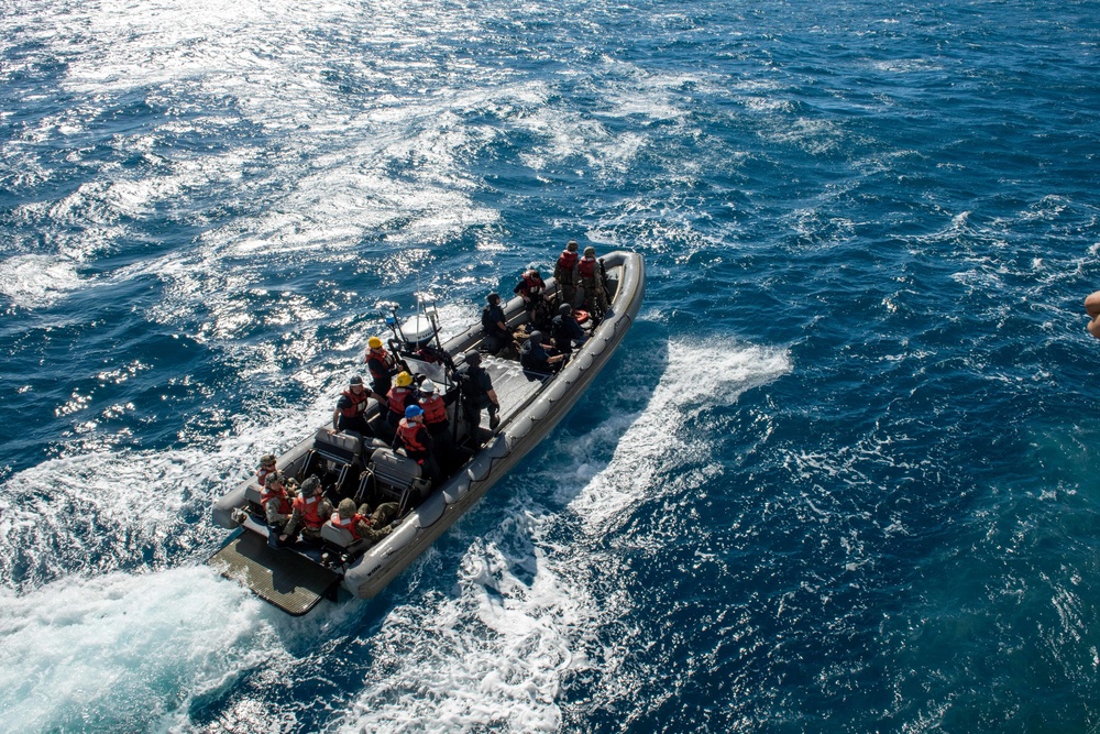 Sailors and Marines aboard USS Germantown conduct RHIB operations.