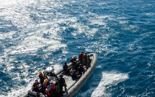 Sailors and Marines aboard USS Germantown conduct RHIB operations.