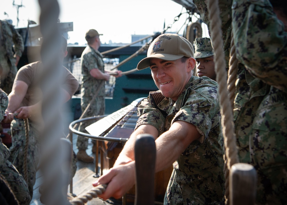 Airman Paul Stickney sets spanker sail