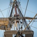 U.S. Sailors unfurl the mizzen top sail