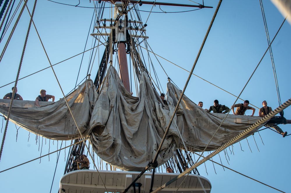 Airman Paul Stickney sets spanker sail