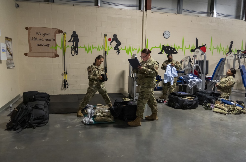 Deployed Airman complete mobility bag check