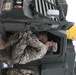 Soldier from 1-147 FA gives Ethan Manson a tour of M270A1 MLRS