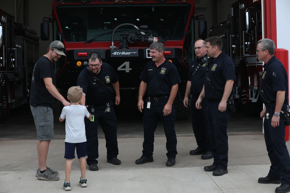 Firefighters at Camp Ripley give Ethan Manson facilities tour