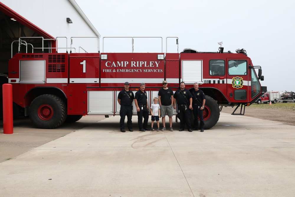 Firefighters at Camp Ripley give Ethan Manson facilities tour