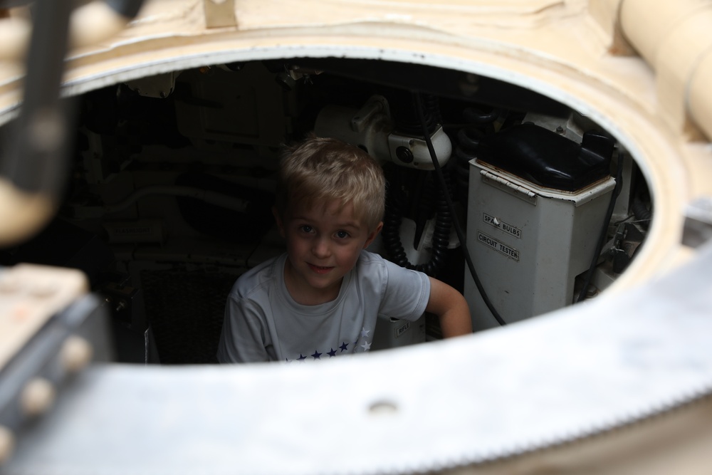 2nd Combined Arms Battalion 136th Infantry Regiment gives Ethan Manson a tour of M1 Abrams Tank