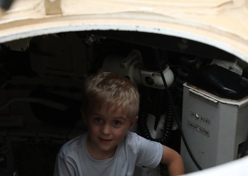 2nd Combined Arms Battalion 136th Infantry Regiment gives Ethan Manson a tour of M1 Abrams Tank