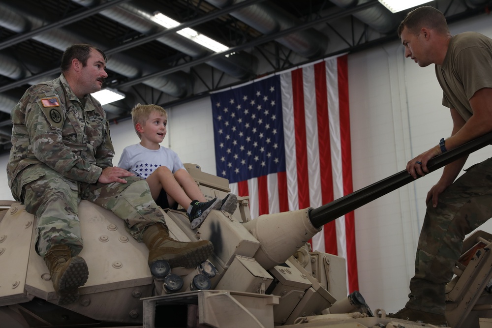 2nd Combined Arms Battalion 136th Infantry Regiment gives Ethan Manson a tour of a Bradley Fighting Vehicle