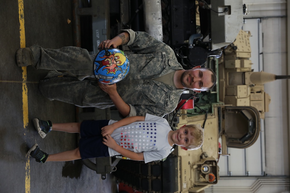 2nd Combined Arms Battalion 136th Infantry Regiment gives Ethan Manson a tour of M1 Abrams Tank