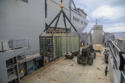 LSV-4 conducts joint maritime equipment transfer of Army Preposition Stock with the U.S. Naval Ship Fisher