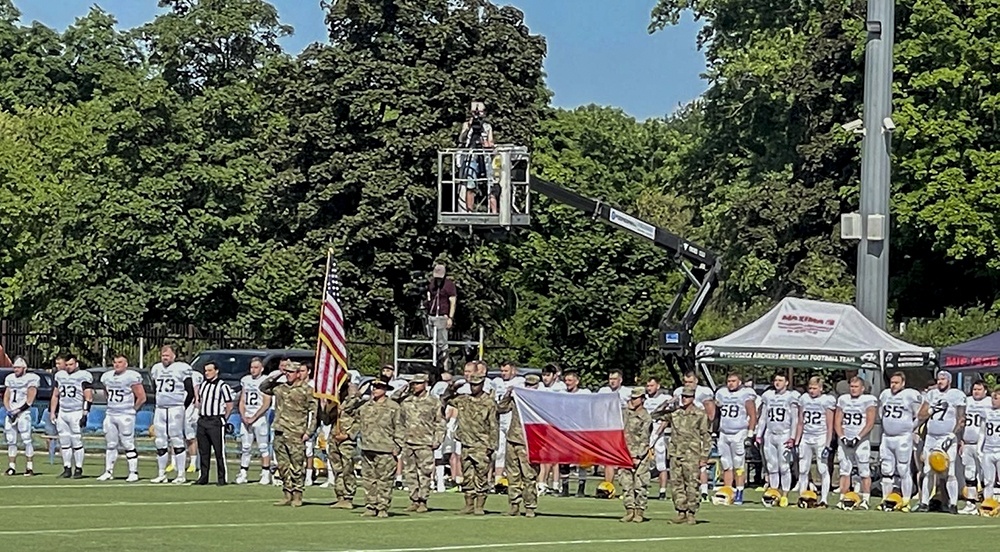 Deployed Soldiers represent US Army at football game in Poland