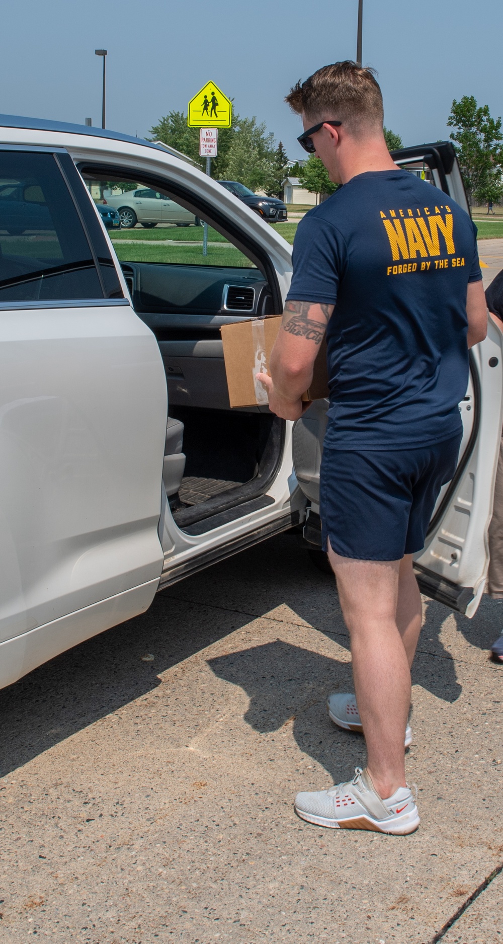 Sailors Hand Out Pre-packed Lunches during Fargo Navy Week