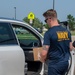 Sailors Hand Out Pre-packed Lunches during Fargo Navy Week