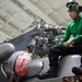 HSM-37 Sailor Conducts Maintenance On An MH-60R Sea Hawk
