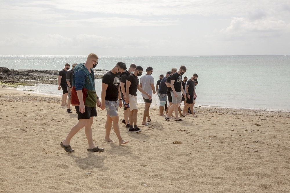 Marines wipe out trash in hidden beach