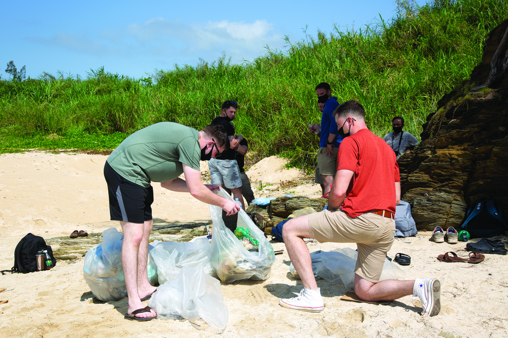 Marines wipe out trash in hidden beach