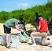 Marines wipe out trash in hidden beach