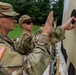 Sgt. Michael Yarrington and Maj. Zack Land discuss scoring after shooting an M17 pistol