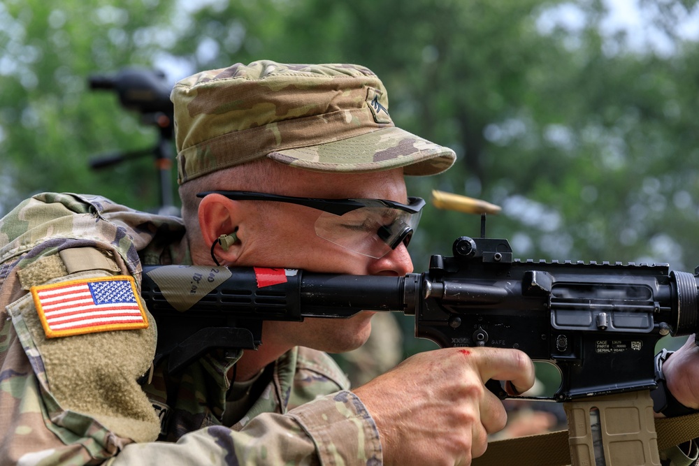 Sgt. Michael Yarrington fires an M4 rifle
