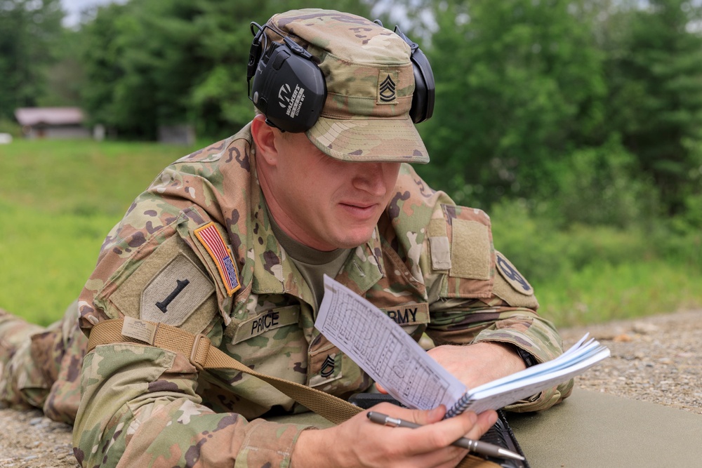 Sgt. 1st Class Shane Price studies his shot group