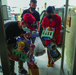 Big smiles are all that matters: III MEB Marines and sailors donate toys to children with special needs