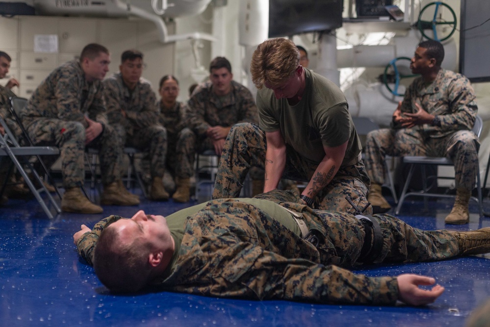 U.S. Navy Corpsmen Instruct a Combat Life Saver Class